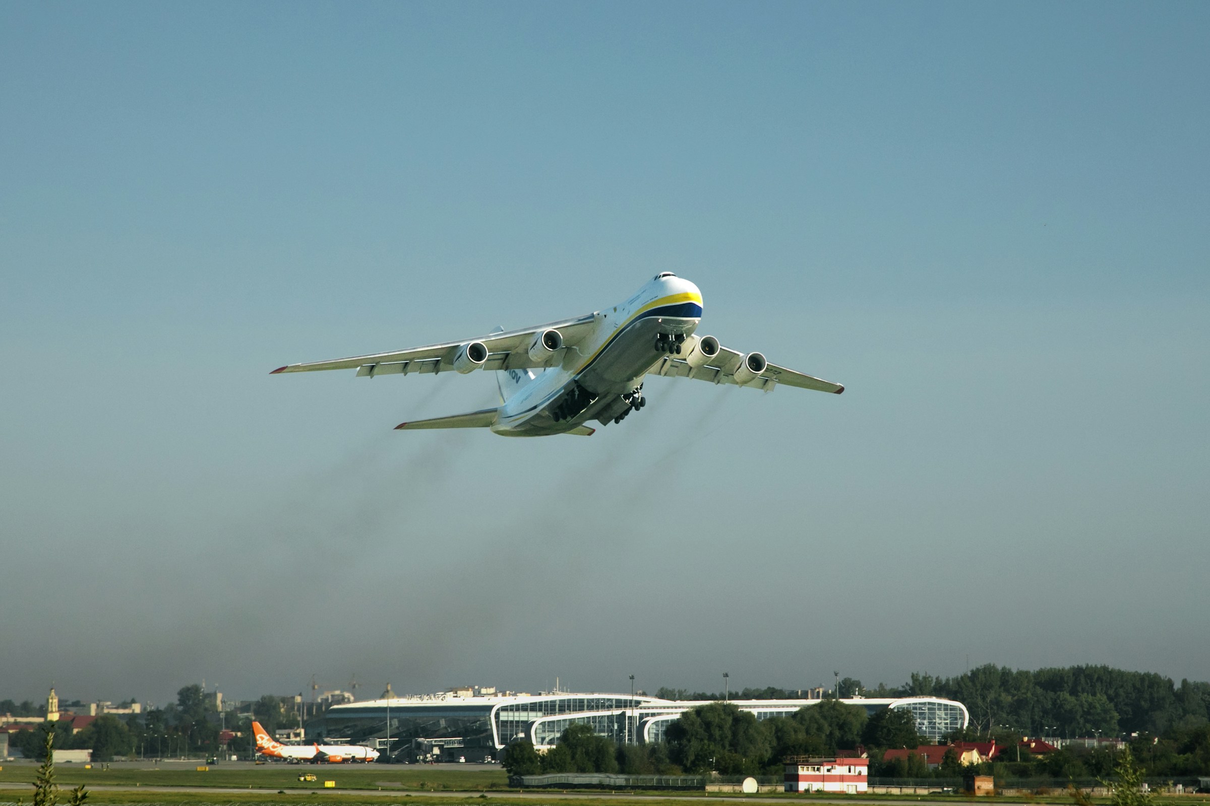 Antonov An-124 cargo aircraft above Lviv airport, with nose, tail and both wingtips in frame